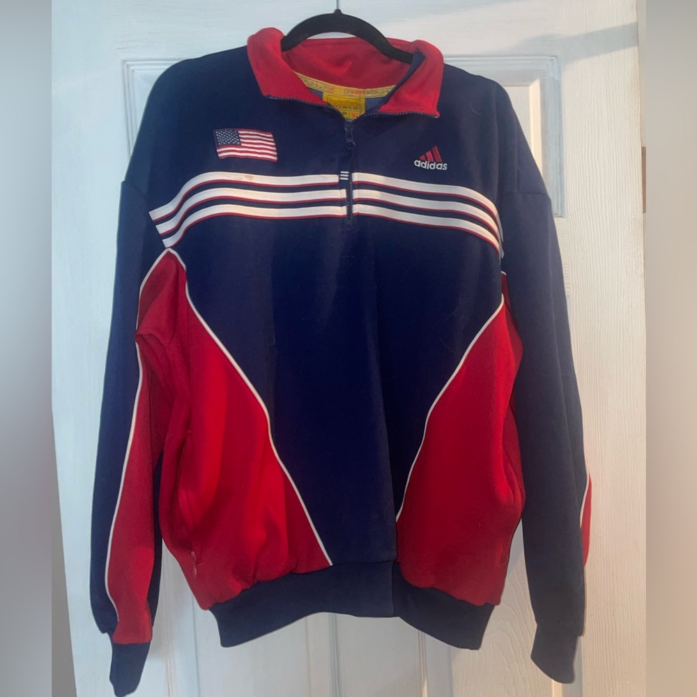 ADIDAS FIFA Women’s USA99 World Cup bomber jacket with two zipper pockets.